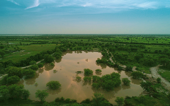 The restored water body at Dhun in full monsoon, seen from the air