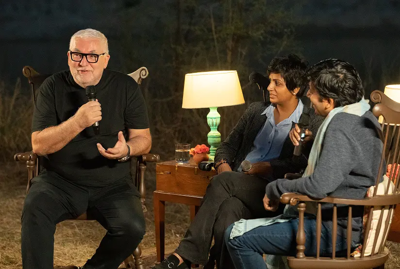An evening conversation held by lamplight in the landscape at Dhun